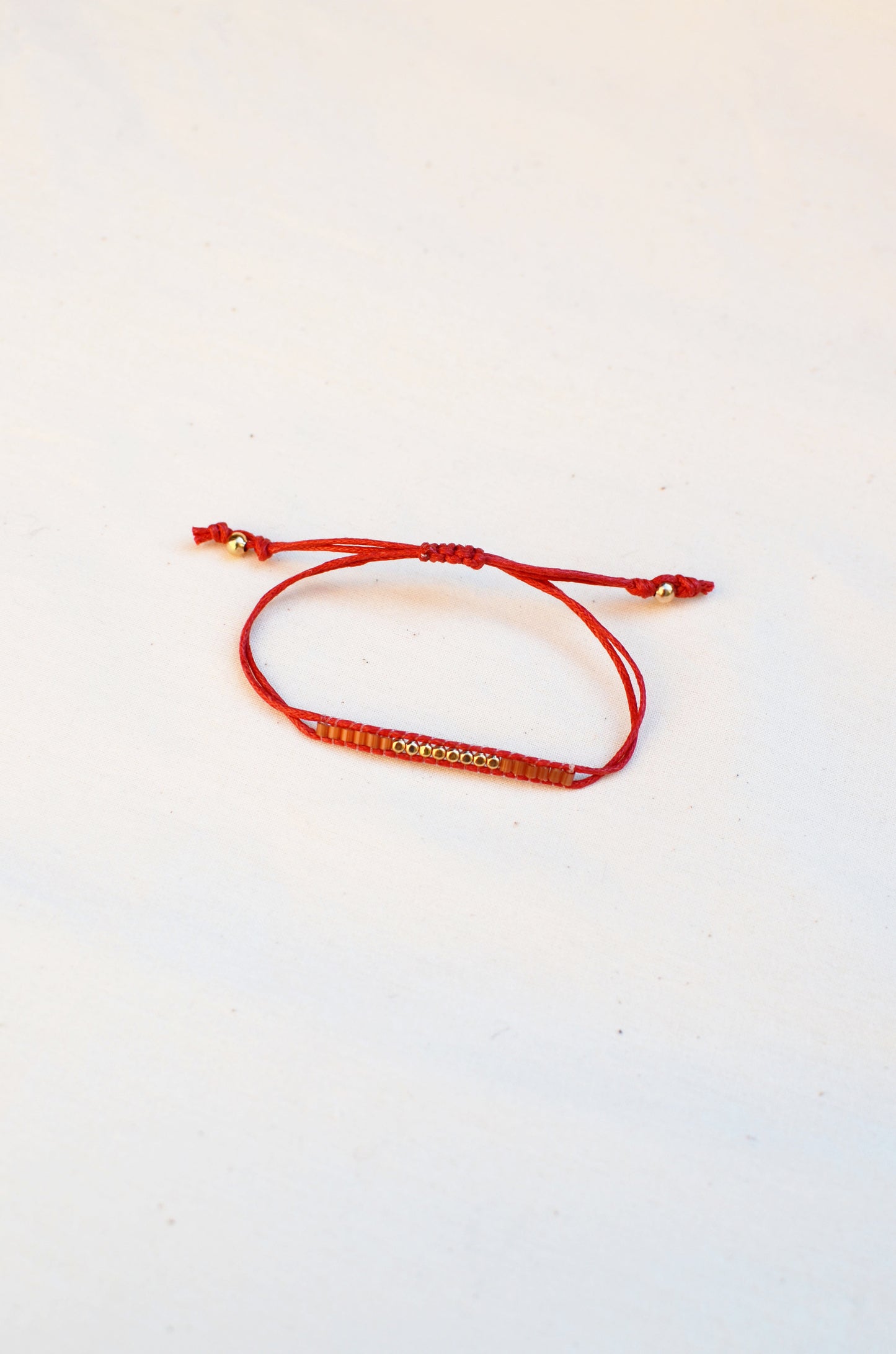 Lucky Micro Beads Woven Bracelet with Red Cotton Cords