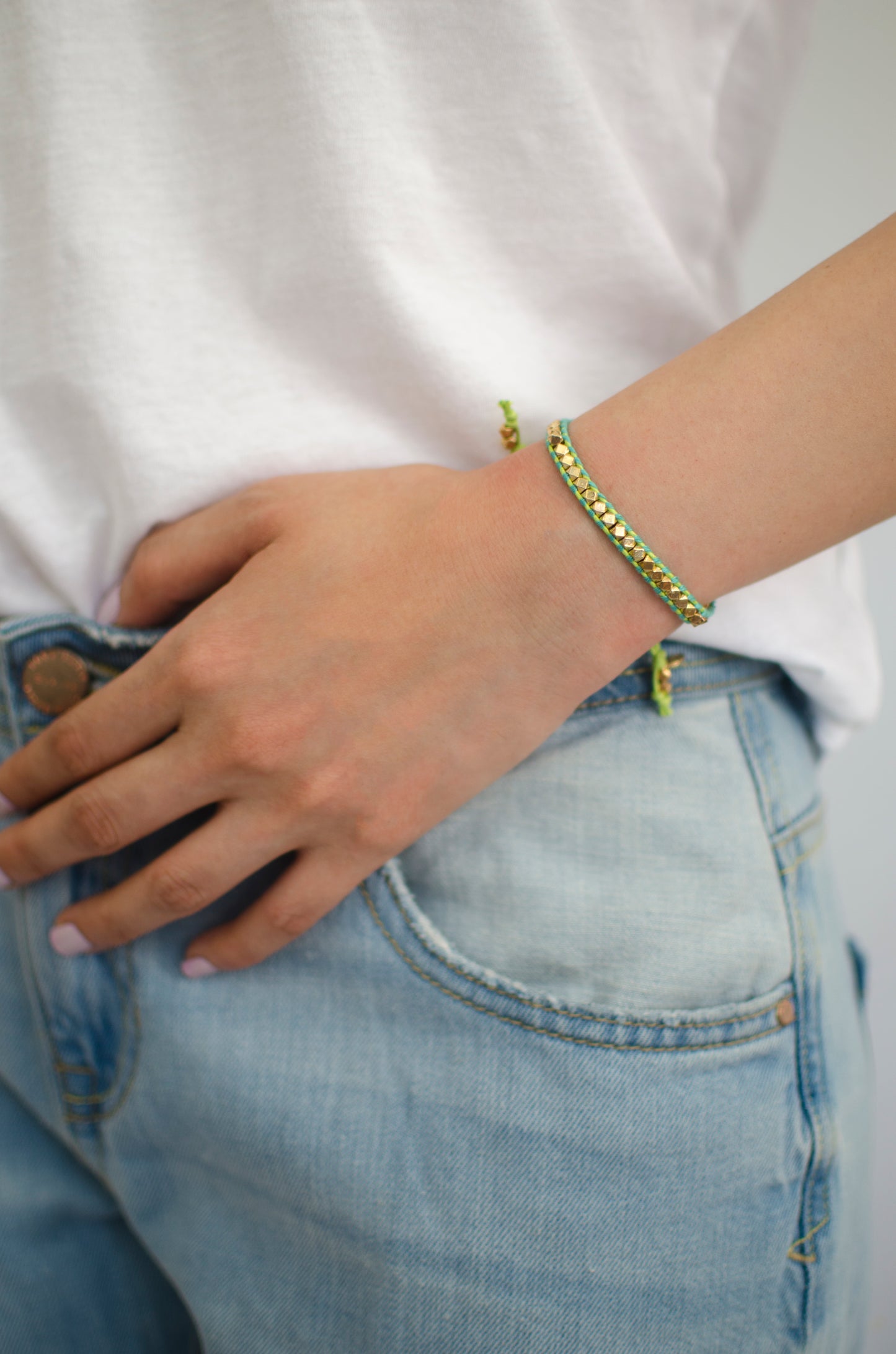 Rainbow One Row Gold Nugget Woven Bracelet with Teal Threads on Lime Cords