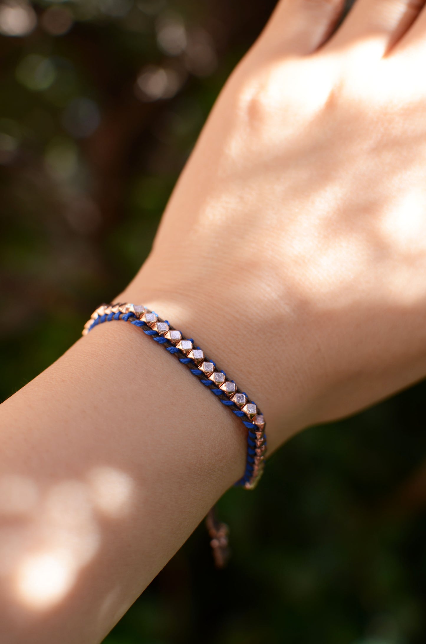 Rainbow One Row Rose Gold Nugget Woven Bracelet with Navy Threads on Brown Cords